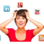 A woman holding her head with social media icons around it.