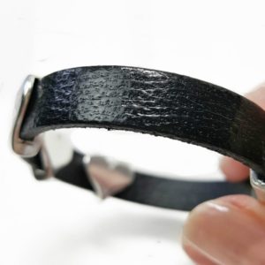 Side view of the heart leather bracelet showing the high quality texture of the leather.