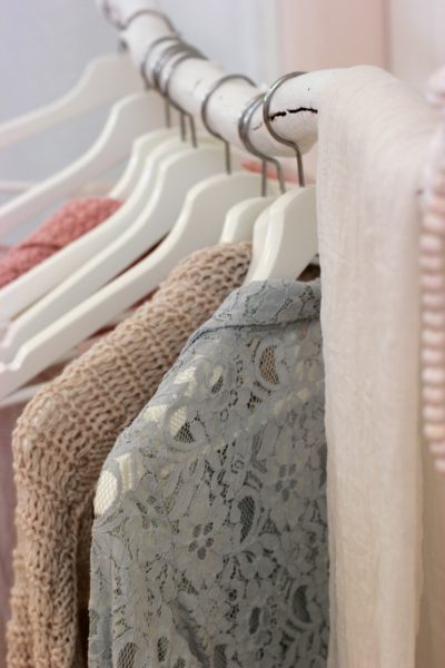 Outfit ideas on a closet rack