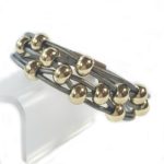 Gray Leather Bracelet Gold Beads close up