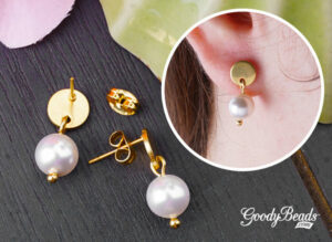 DIY picture of golden pearl post earrings.