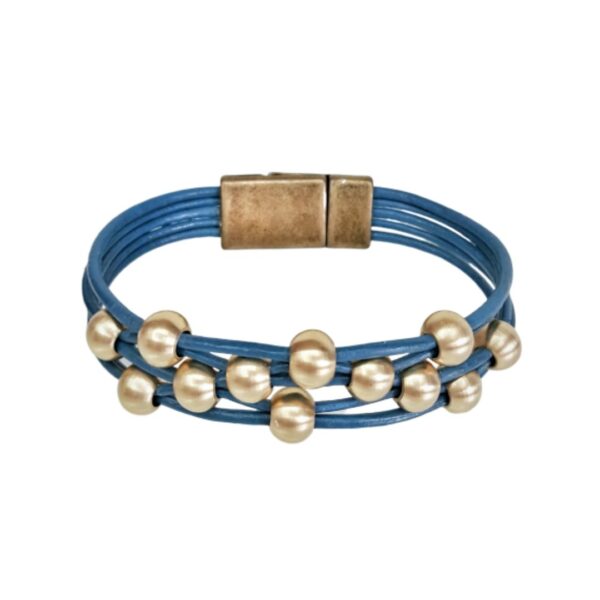 A blue leather bracelet with gold beads and magnetic clasp.