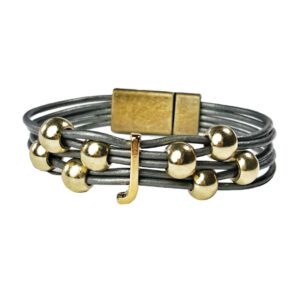 A bracelet with gold beads and a magnetic clasp.