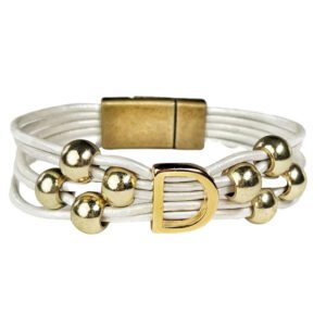 A white leather bracelet with gold beads and an initial.