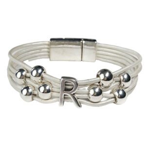 A white leather bracelet with silver beads and an initial.