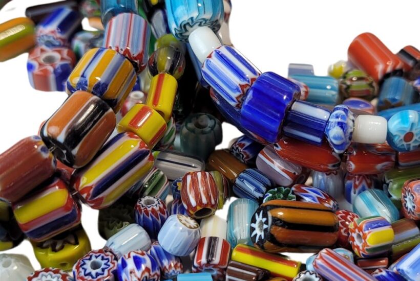 A pile of colorful beads sitting on top of each other.